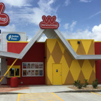 Wienerschnitzel hot dog franchise and Tastee Freez A-frame style restaurant from the outside